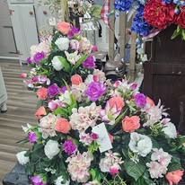 Mixed pastel rose and lisianthus sympathy spray