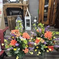 Bright orange, purple, and yellow spring centerpieces