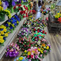 Vibrant mixed bouquets and floral arrangements lining the shop