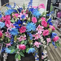 Bright pink, blue, and turquoise mixed floral spray